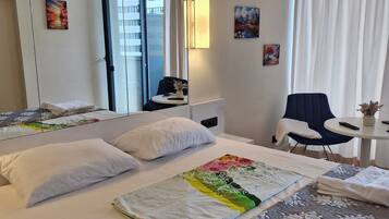 1 habitación, tabla de planchar con plancha y wifi