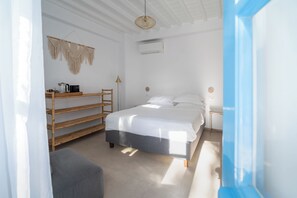 Iron/ironing board, travel crib, free WiFi, bed sheets