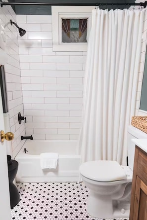 Shower, hair dryer, towels, soap