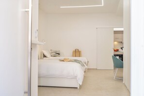 1 bedroom, desk, iron/ironing board, travel crib