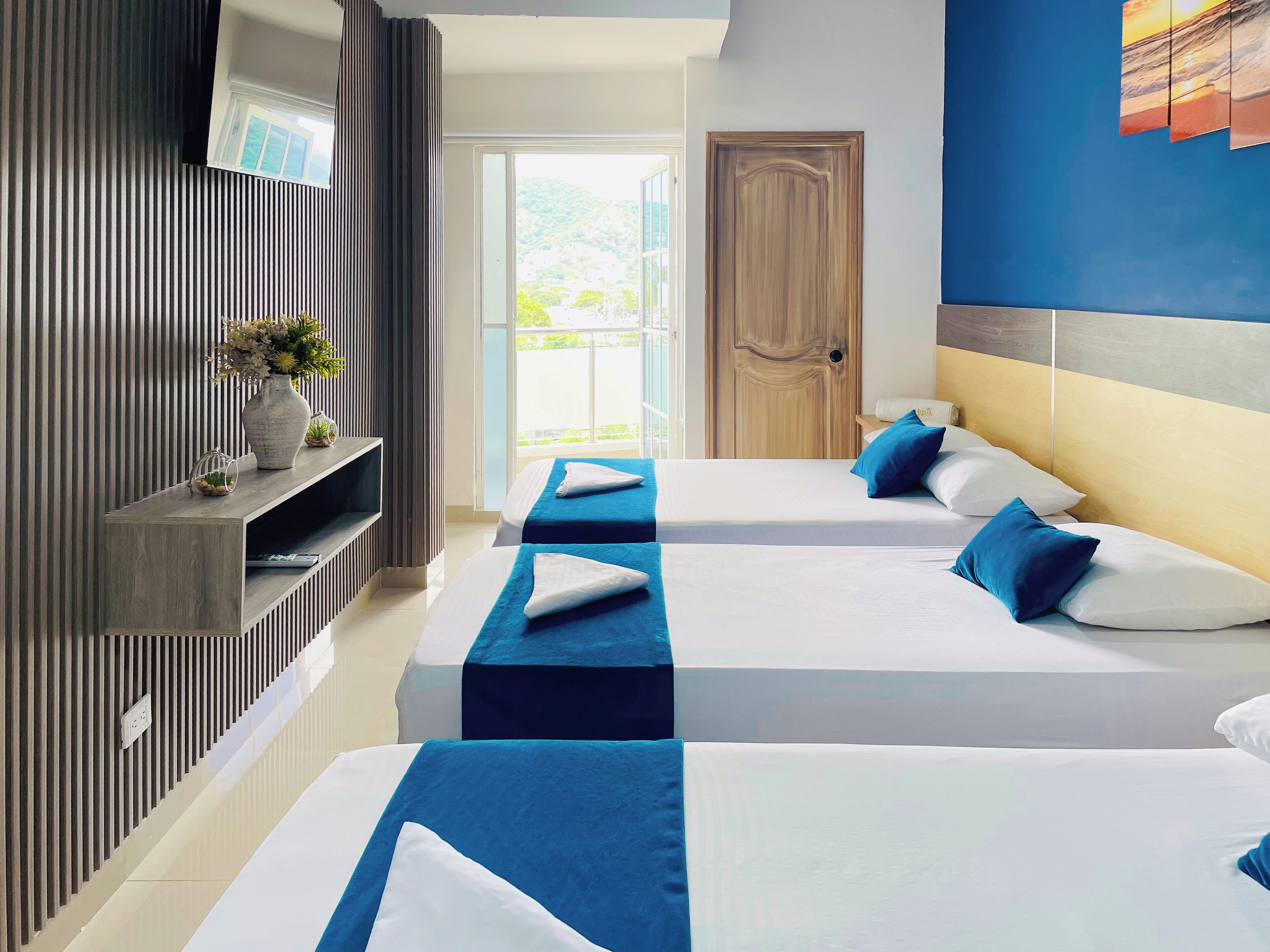 Perhehuone, parveke | Ylelliset vuodevaatteet, ilmainen Wi-Fi, vuodevaatteet