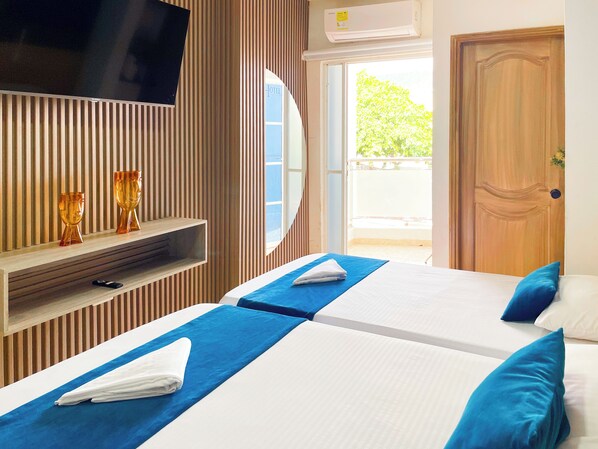 Triple Room, Balcony | Premium bedding, free WiFi, bed sheets - Hotel Caribe Real Inn (Santa Marta)