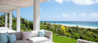 Contemporary Beachfront Escape with Private Pool on Windermere's World-Famous Pink Sand Beach