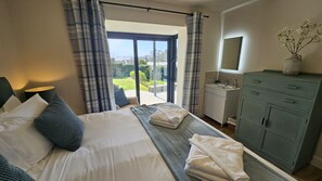 4 bedrooms, iron/ironing board, travel cot, WiFi