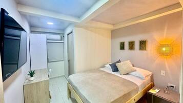 In-room safe, laptop workspace, blackout curtains, iron/ironing board