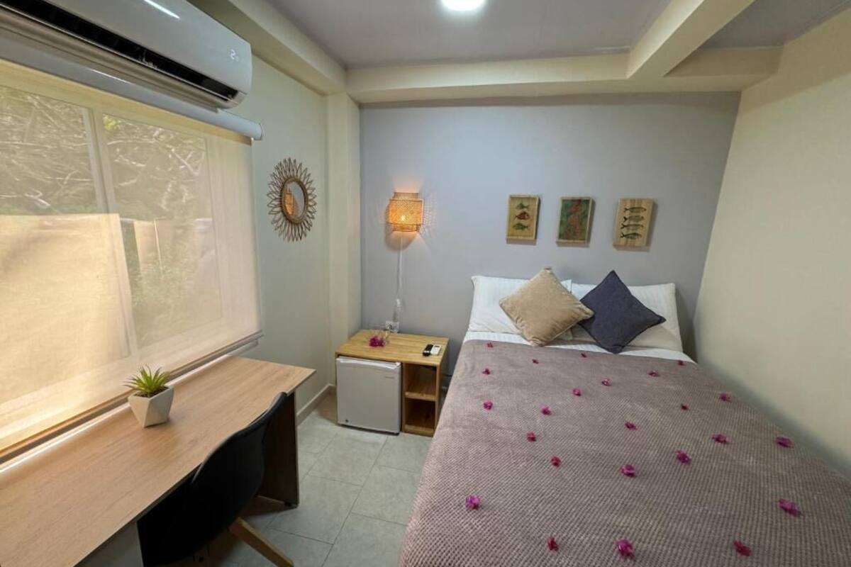 Economy Double Room, 1 Double Bed, Private Bathroom | In-room safe, laptop workspace, blackout curtains, iron/ironing board