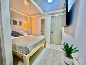 Economy Double Room, 1 Double Bed, Private Bathroom | In-room safe, laptop workspace, blackout curtains, iron/ironing board