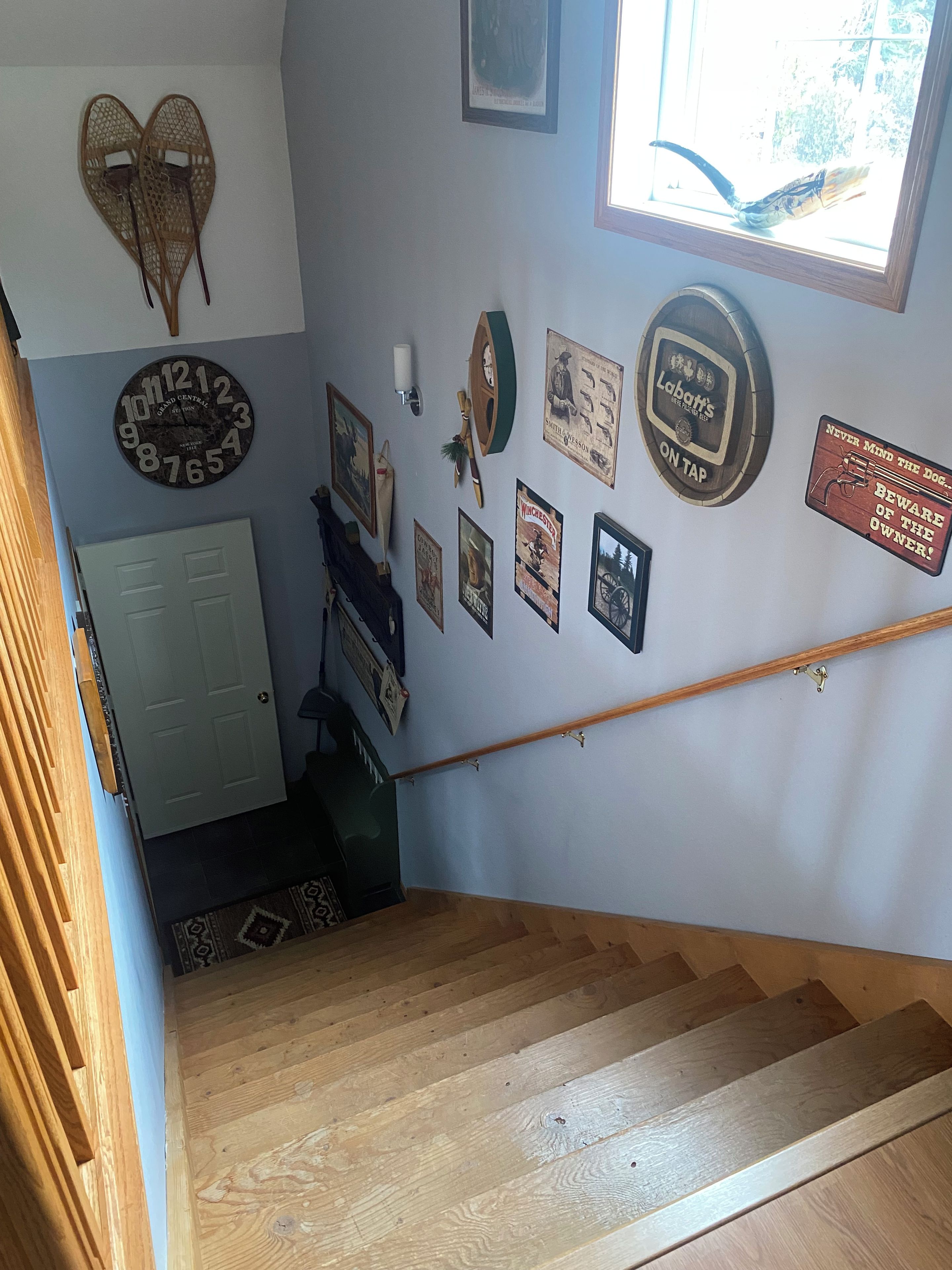 A staircase with wooden steps leading to a landing.