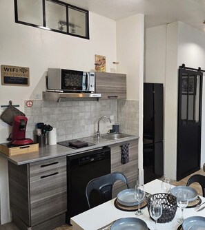 Fridge, microwave, dishwasher, coffee/tea maker
