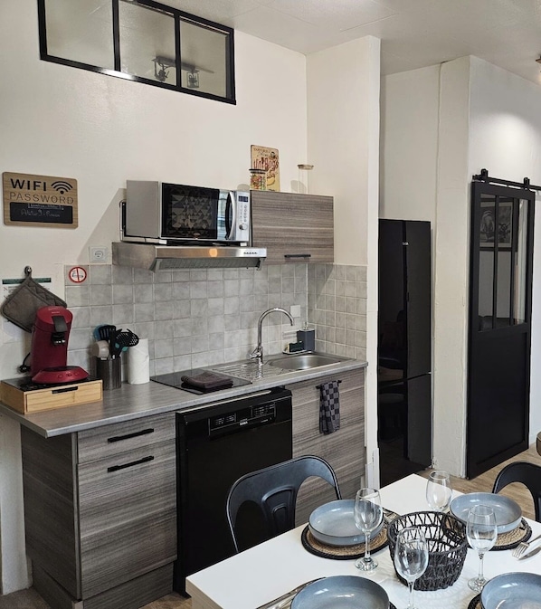 Fridge, microwave, dishwasher, coffee/tea maker