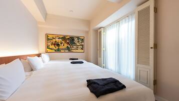 Kamar Triple Deluks, Beberapa Tempat Tidur, sudut | Meja kerja, setrika/meja setrika, dan Wi-Fi gratis