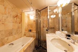 Deluxe Double Room, Corner | Bathroom | Hair dryer, slippers, towels, shampoo
