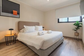 1 bedroom, desk, iron/ironing board, travel cot
