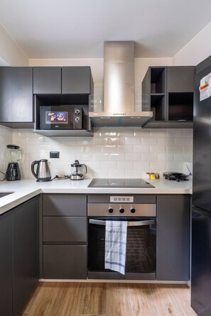 Fridge, microwave, coffee/tea maker, toaster