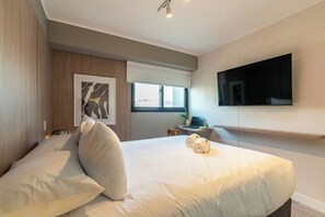 1 bedroom, desk, iron/ironing board, travel crib