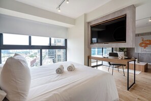 1 bedroom, desk, iron/ironing board, travel crib