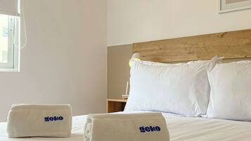 Iron/ironing board, travel crib, free WiFi, bed sheets