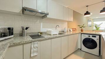 Fridge, microwave, stovetop, coffee/tea maker