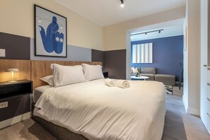 1 bedroom, desk, iron/ironing board, travel crib