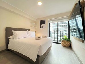 1 bedroom, desk, iron/ironing board, travel cot