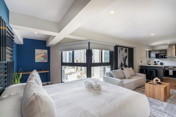 1 bedroom, desk, iron/ironing board, travel crib