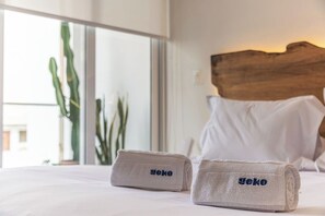 1 habitación, tabla de planchar con plancha y cuna de viaje 