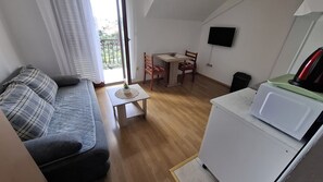 Fernseher, Kamin