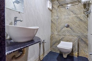 Deluxe Room | Bathroom | Shower, rainfall showerhead, free toiletries, towels - FabHotel Silver Inn (Ahmedabad)