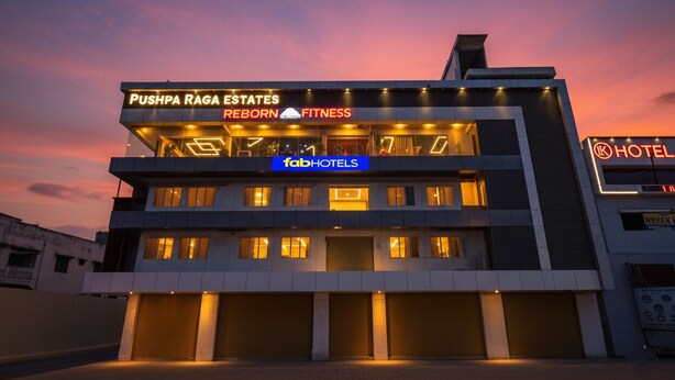 Pushpa Raga Estates with a fitness center and FabHotels branding. - Fabhotel Siddarth Prime (Penumuluru)
