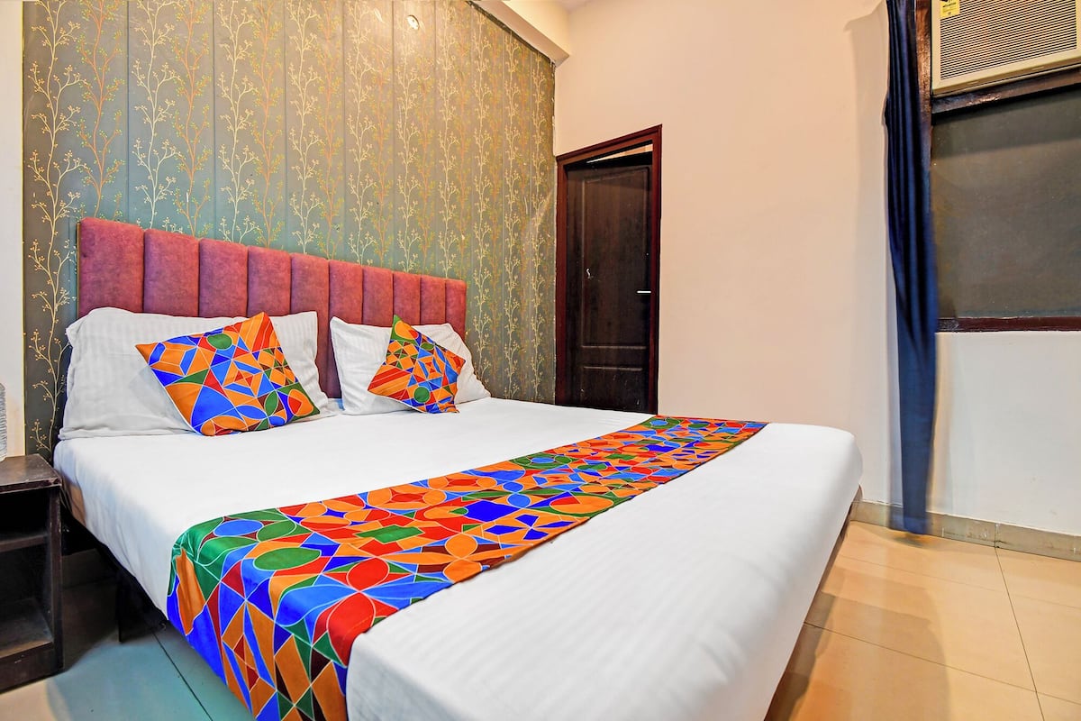 Deluxe kamer | Lakens van Egyptisch katoen, luxe beddengoed, een kluis op de kamer