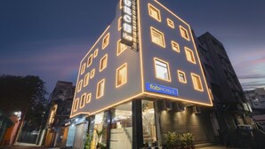 A multi-story building with a sign for 'fabHOTELS' and 'Church View' on the facade. - FabHotel Church View - 500m from New Delhi Railway Station (New Delhi)