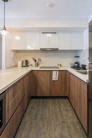 Fridge, microwave, stovetop, coffee/tea maker