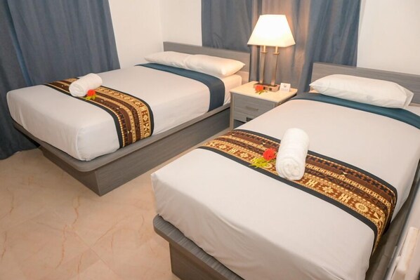 Standard Triple Room, Non Smoking, Ground Floor | Blackout drapes, iron/ironing board, free WiFi