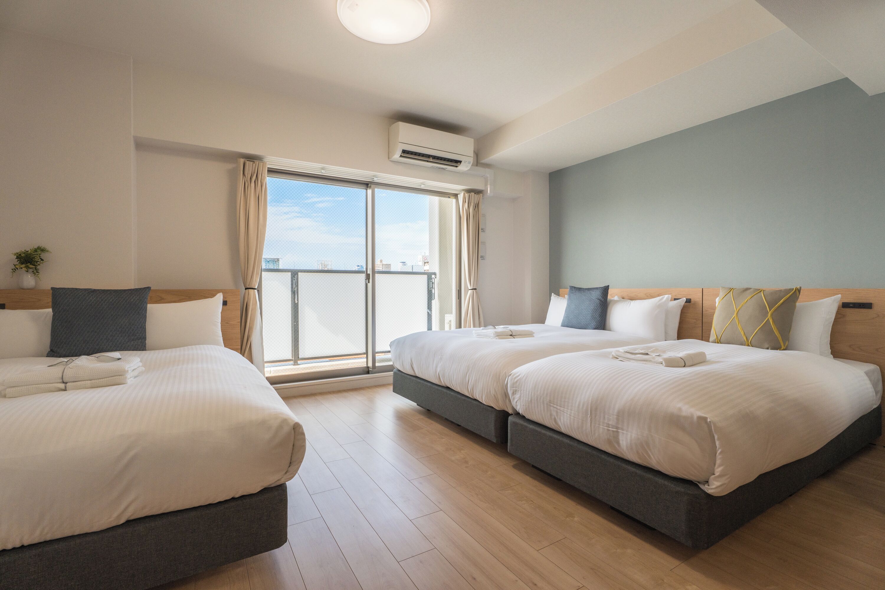 エクスクルーシブ アパートメント ラナイ シティビュー | 高級寝具、WiFi (無料)、ベッドシーツ