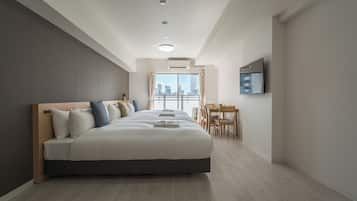 Habitación triple exclusiva, lanai, vista a la ciudad | Ropa de cama de alta calidad, wifi gratis y ropa de cama