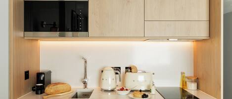 Mini-fridge, microwave, stovetop, dishwasher