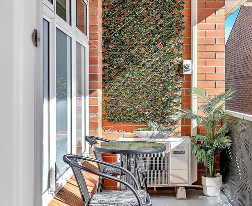 2 Bedroom Seaside Suite just Steps from the Shore + Arcade & Balcony