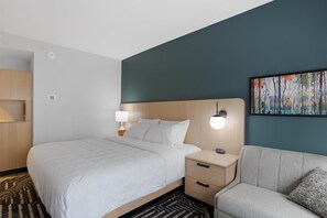 Desk, laptop workspace, blackout drapes, bed sheets