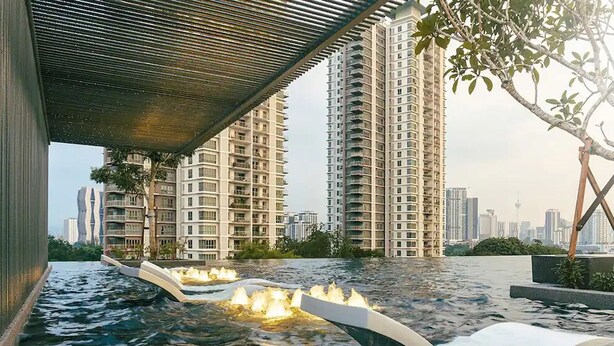 A water feature with lights under a bridge, surrounded by high-rise buildings. - The Pano Green Sentul Park (Kuala Lumpur)