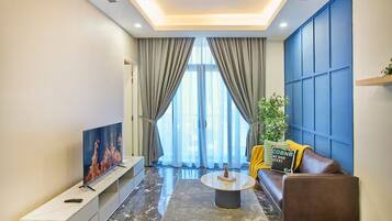 Apartemen Superior, 2 kamar tidur, balkon, pemandangan kota | Area keluarga | TV layar datar