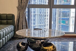 Superior Apartment, 1 Bedroom, Balcony, City View | Living area | Flat-screen TV