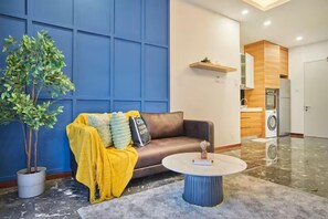 Superior Apartment, 2 Bedrooms, Balcony, City View | Living area | Flat-screen TV