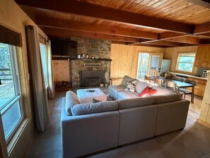 Smart TV, fireplace, foosball, books