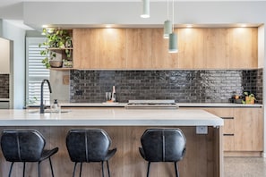 Fridge, microwave, oven, stovetop - One Palm - Beautifully designed home in Aureus Estate (Skennars Head)