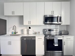 Fridge, microwave, oven, stovetop - Upgraded Apartment in Old Fourth Ward (Atlanta)