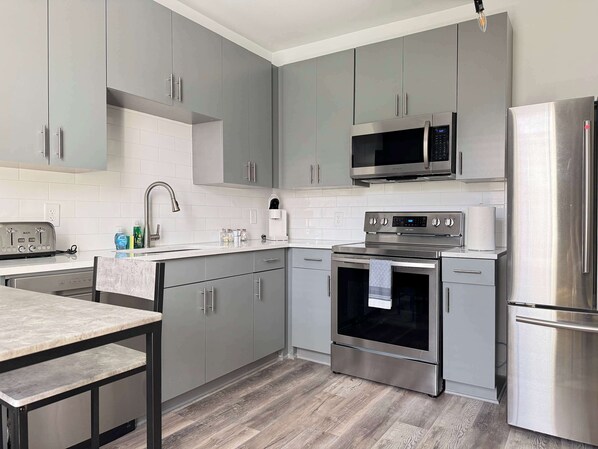 Fridge, microwave, oven, stovetop - Upgraded 2BR Apartment in Old Fourth Ward (Atlanta)
