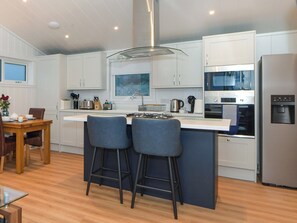 Dishwasher, high chair, cookware/dishes/utensils