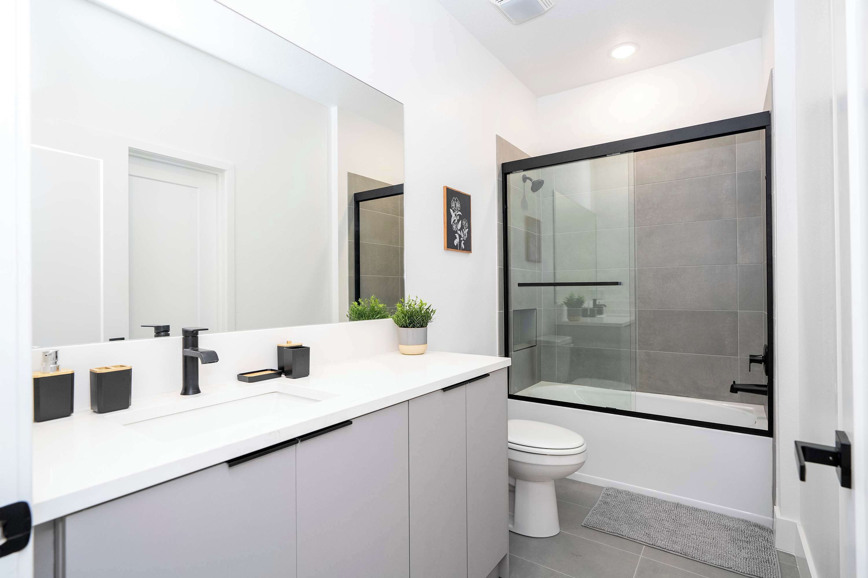Shower, hair dryer, towels, shampoo