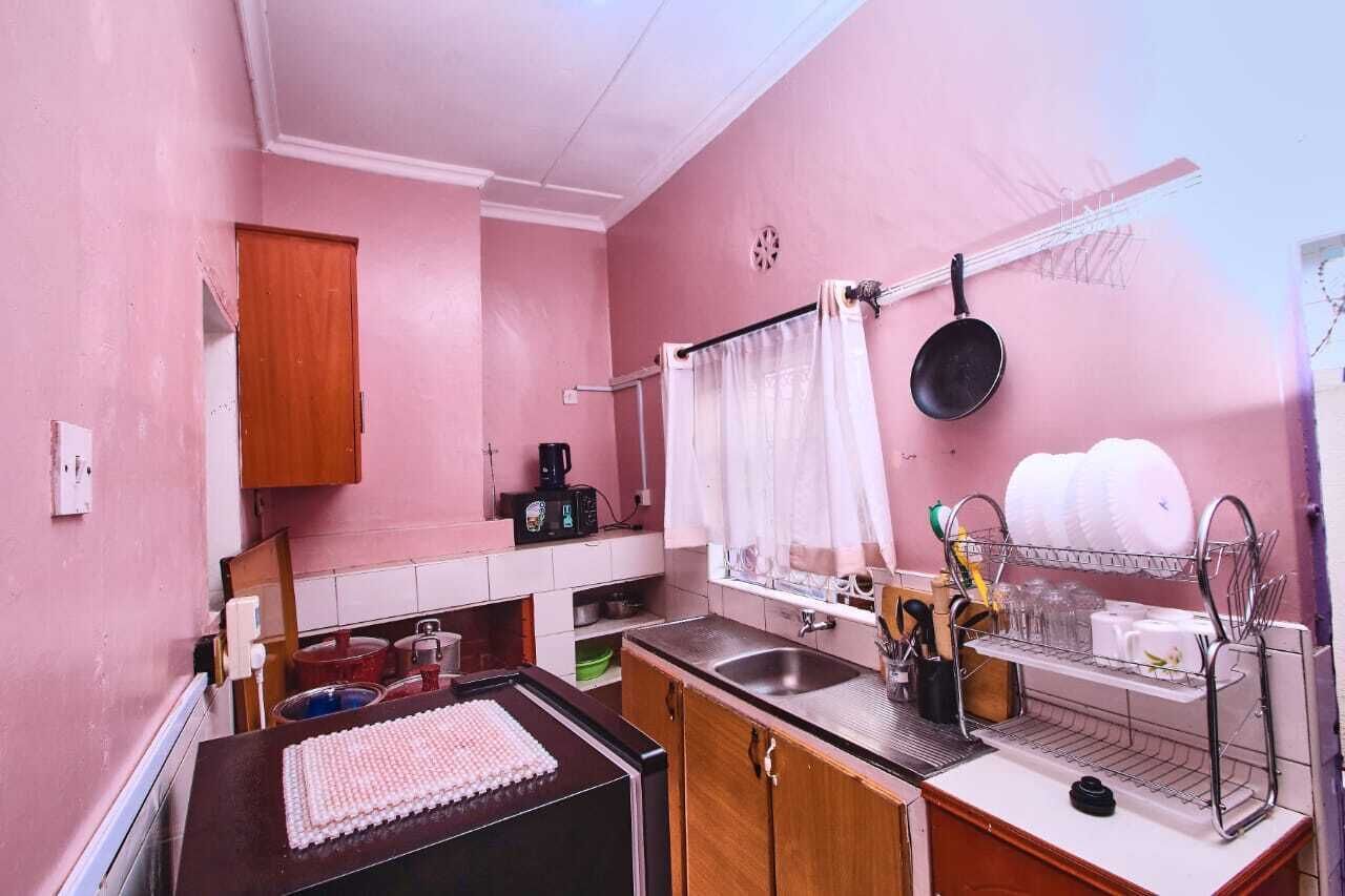 Fridge, microwave, cookware/dishes/utensils