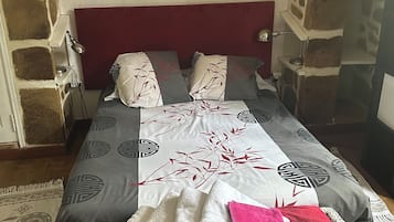 Een strijkplank/strijkijzer, gratis wifi, beddengoed